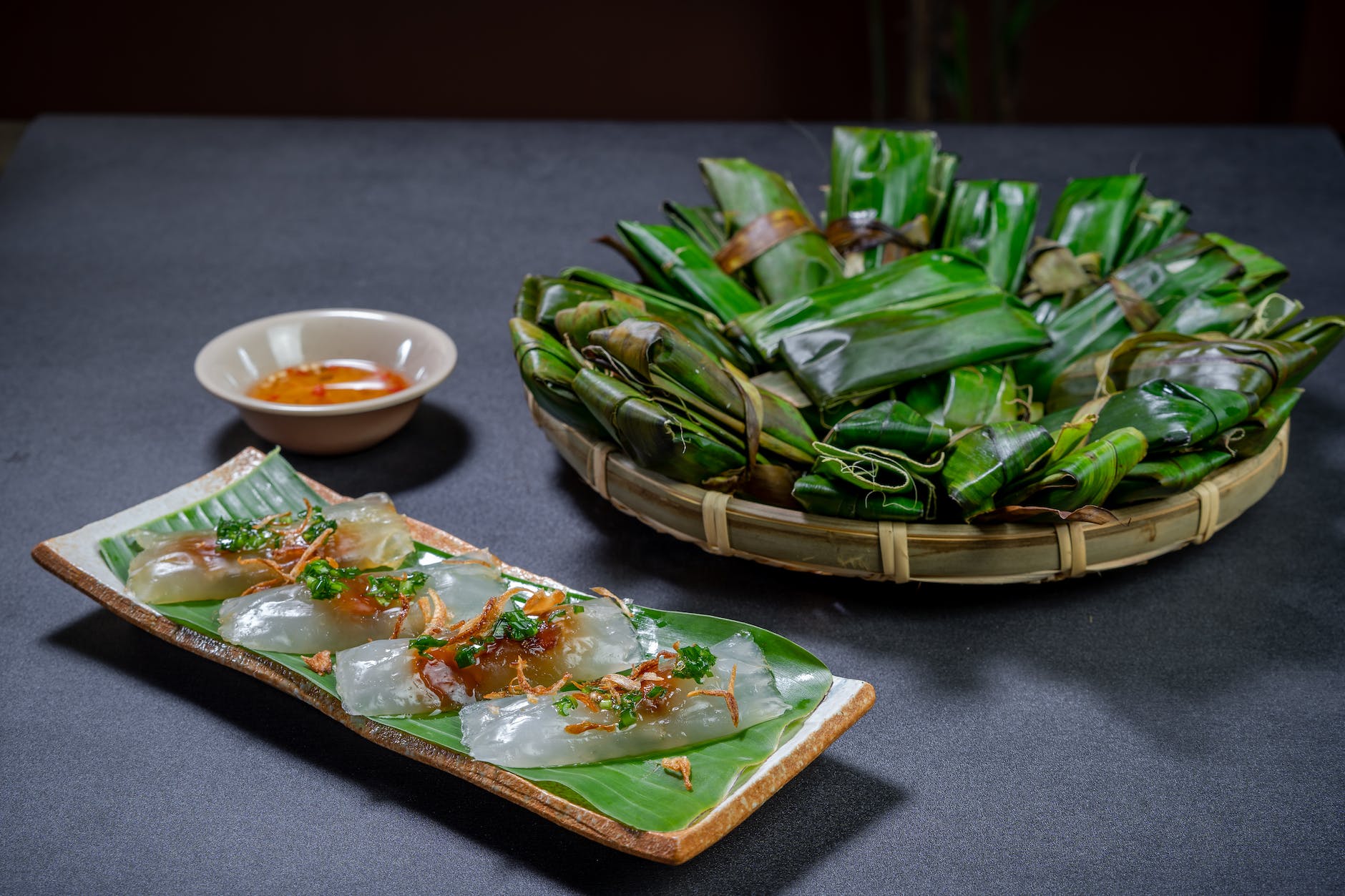 banh bot loc served in a tray with banana leaf