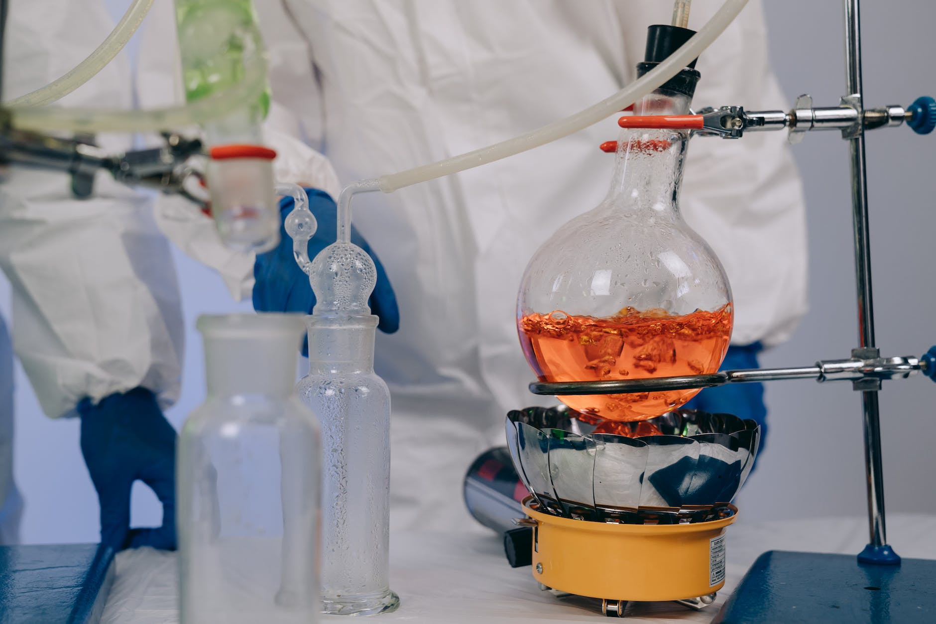 close up photo of chemicals in beakers